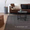 Tapis tressé en laine naturelle de couleur beige d'ivoire blanc